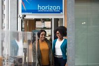two women exiting Horizon CDT located in Computer science